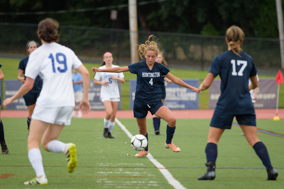 Katie Browne (center) is one of Huntington's key players. (Darin Reed photo)
