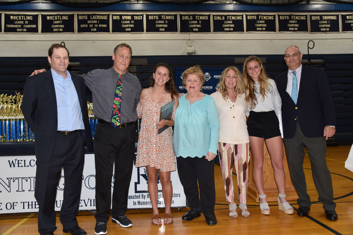 Peter Steen Memorial Scholarship Award recipient Alyssa Sorensen with members of the Steen family 