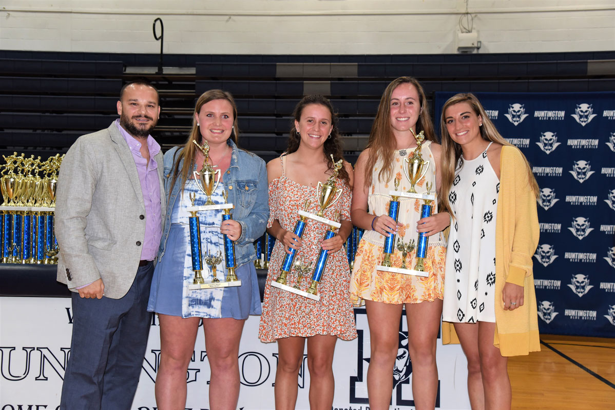 H-ton girls' lacrosse coaches Vinny Tannazzo and Carli Clementi flank award winners Maire Brown, Alyssa Sorensen and Paige Lennon