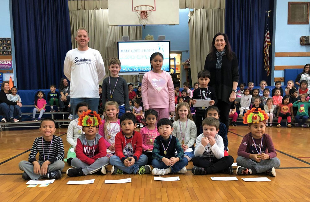 Principal Scott Oshrin and Linda Kohan with November's Southdown Splash Award recipients.