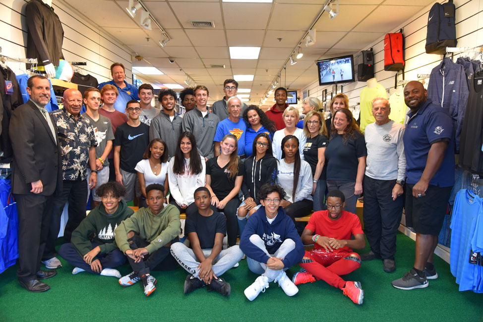 District officials, coaches and Blue Devil athletes turned out to Super Runners Shop along with GLIRC members.