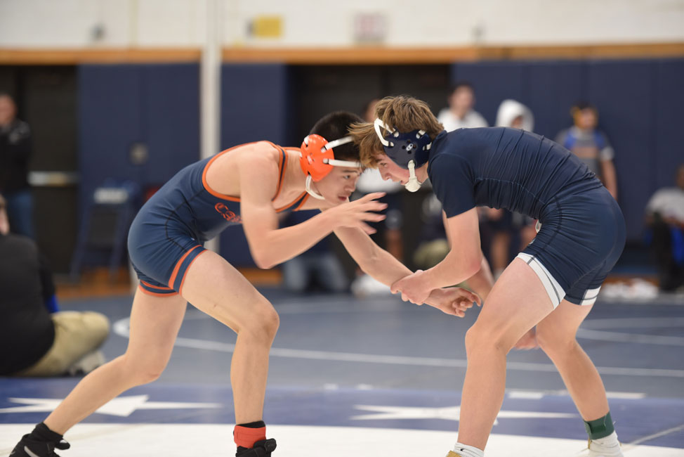 Huntington senior Billy Burton (right) in action earlier this season