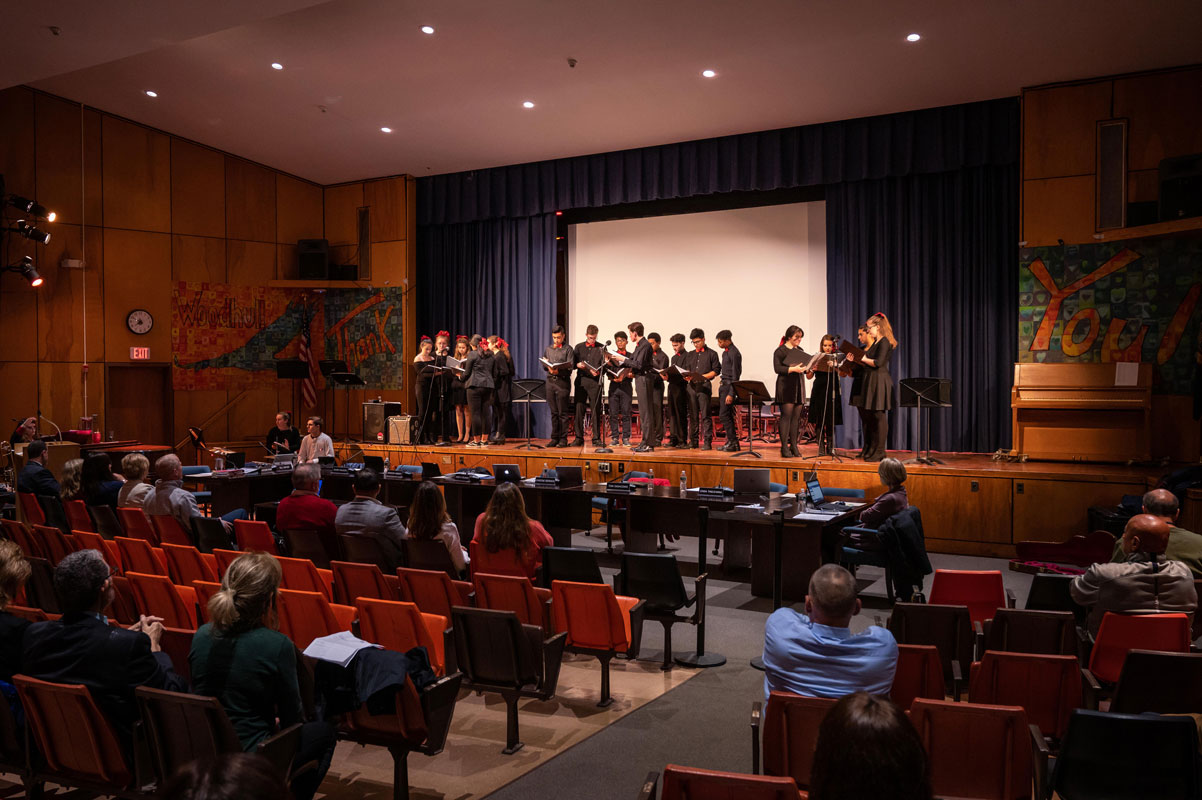 The Huntington musicians performing on stage at the Board of Education meeting.