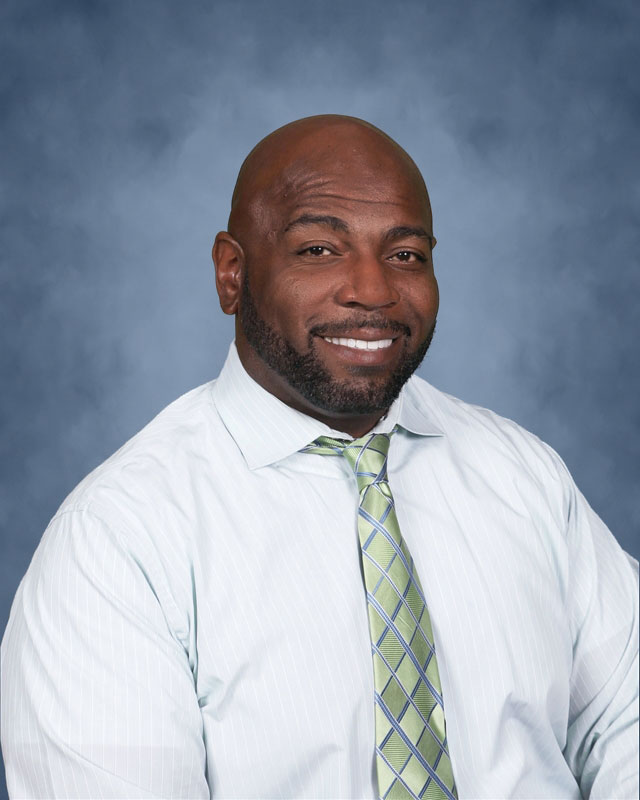 Huntington boys' track and field head coach Ronald Wilson.
