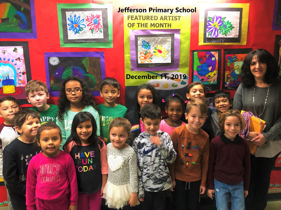 Teacher Maria Mazzola with Jefferson School's Featured Artists of the Month.