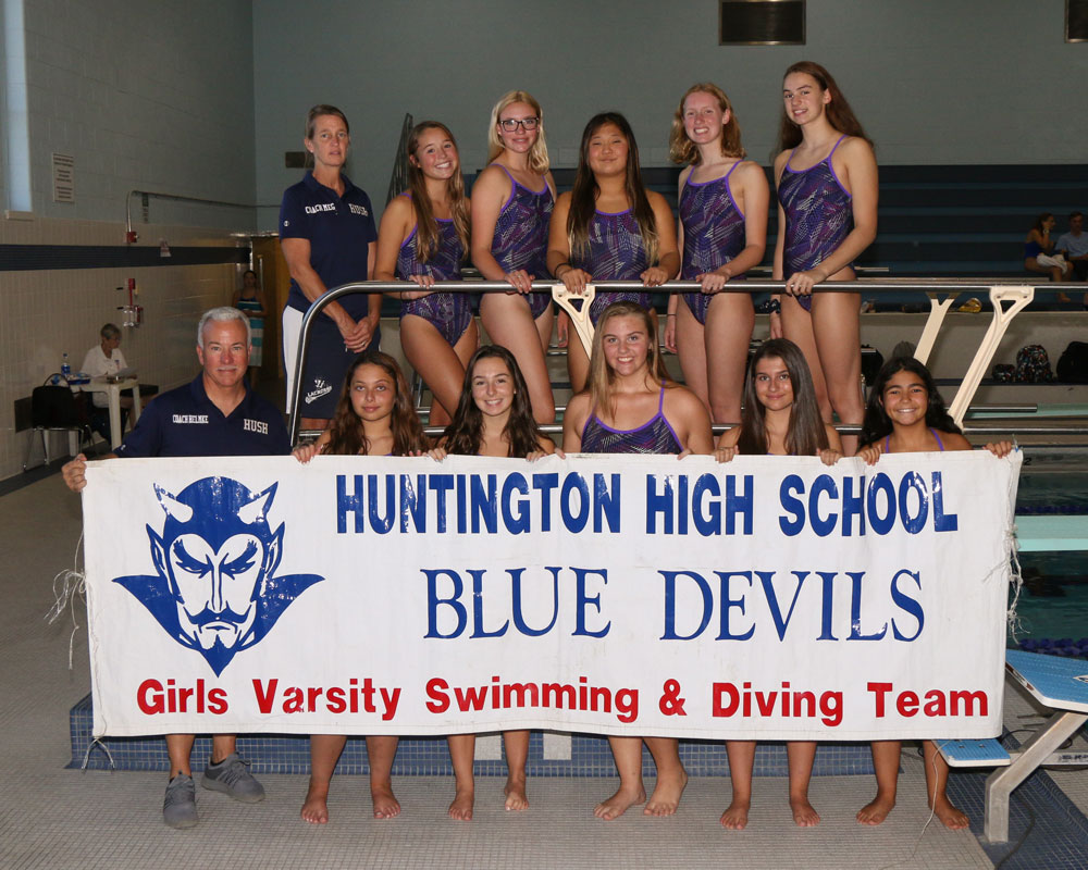 Huntington coaches Chris Helmke and Meg McConnell with the 10 team members from Huntington High School.