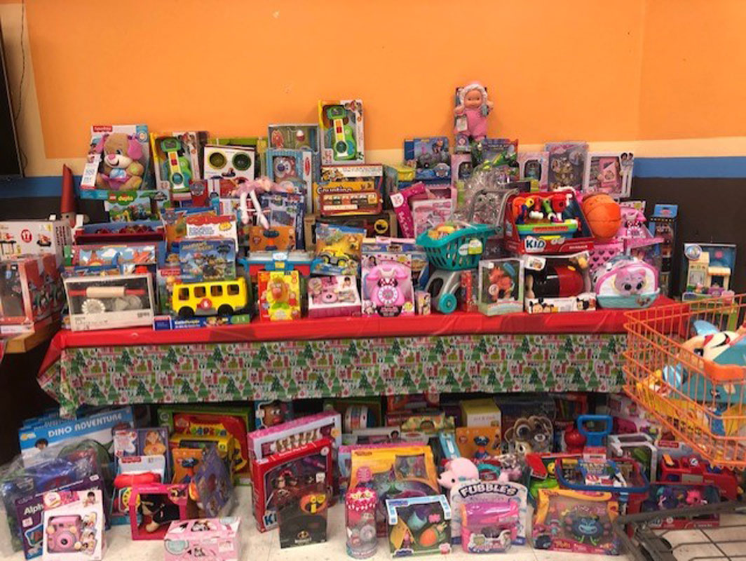 Huntington students helped sort and organize thousands of items donated to Project TOY.