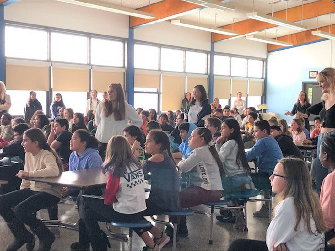 French Honor Society members met with STEM school sixth graders 