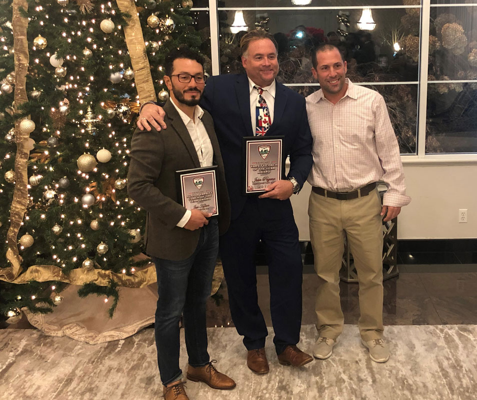 Huntington boys' soccer coaches Jose Alfaro, John Pagano and Jason Suarez at Villa Lombardi's in Holbrook
