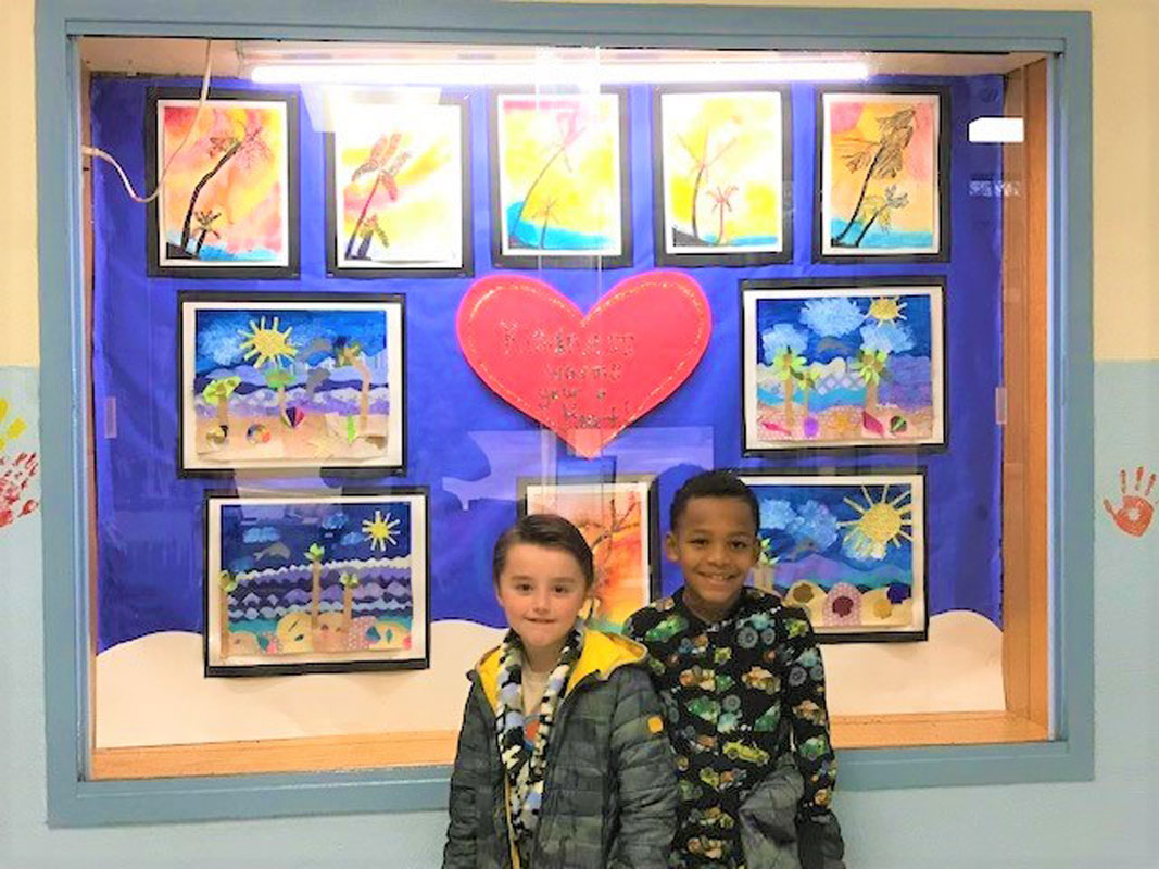 Flower Hill students near the Kindness Tree showcase.