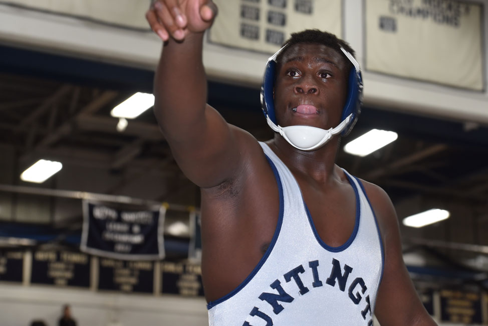Huntington junior Tazadon Smith won the league wrestling tournament.