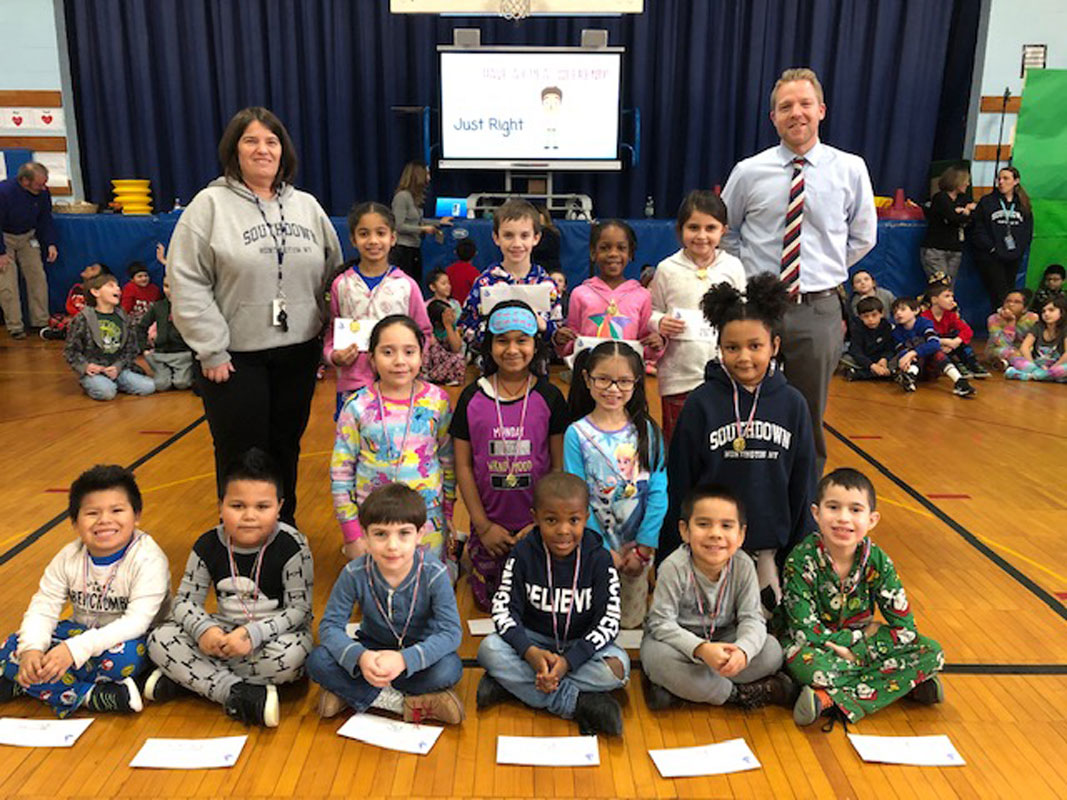 Southdown Principal Scott Oshrin and teacher Lauren Wesnofske with January's Splash Award recipients 