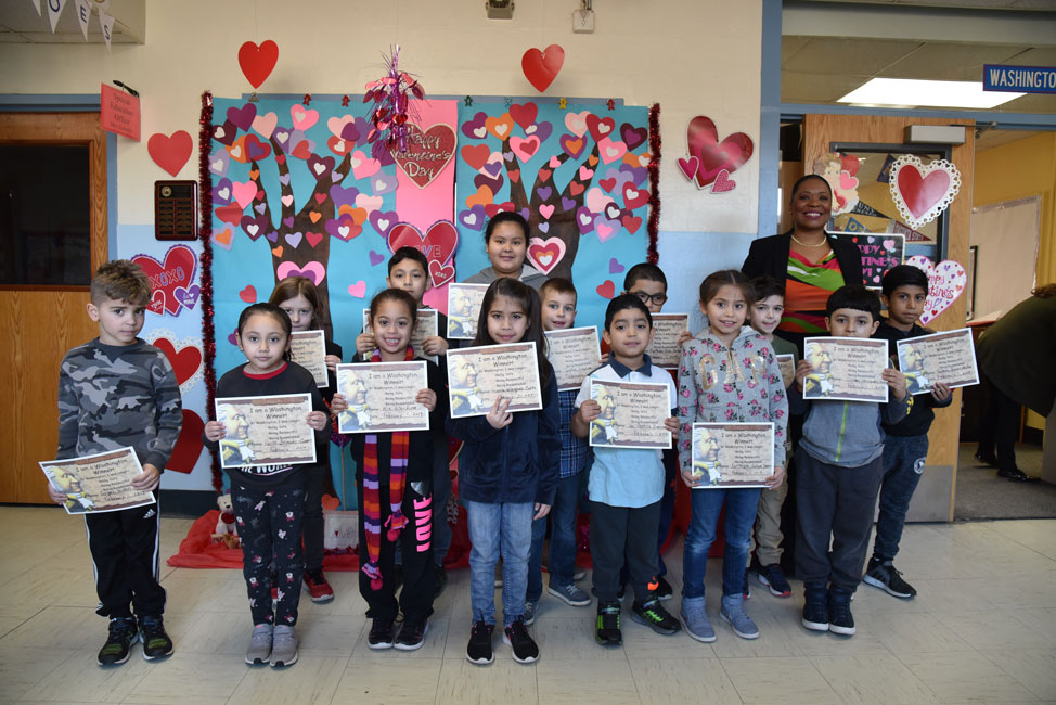 Principal Michelle Richards with the Washington Ways Award recipients for January 