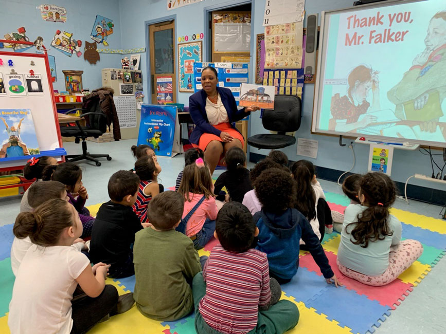 Washington School Principal Michelle Richards recently read to a kindergarten class.