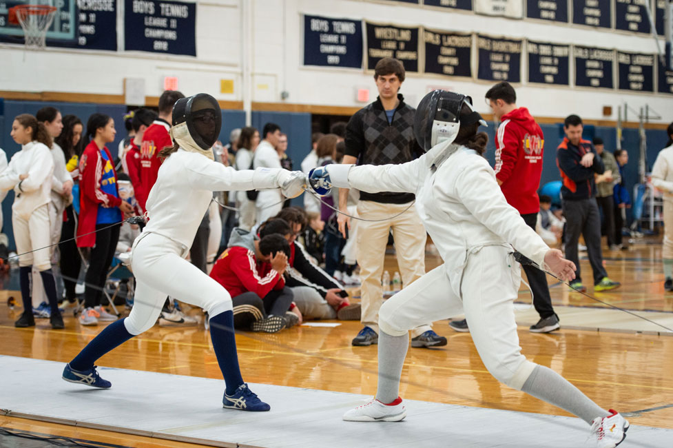The Huntington girls' fencing team strived to make its point. (Darin Reed photo