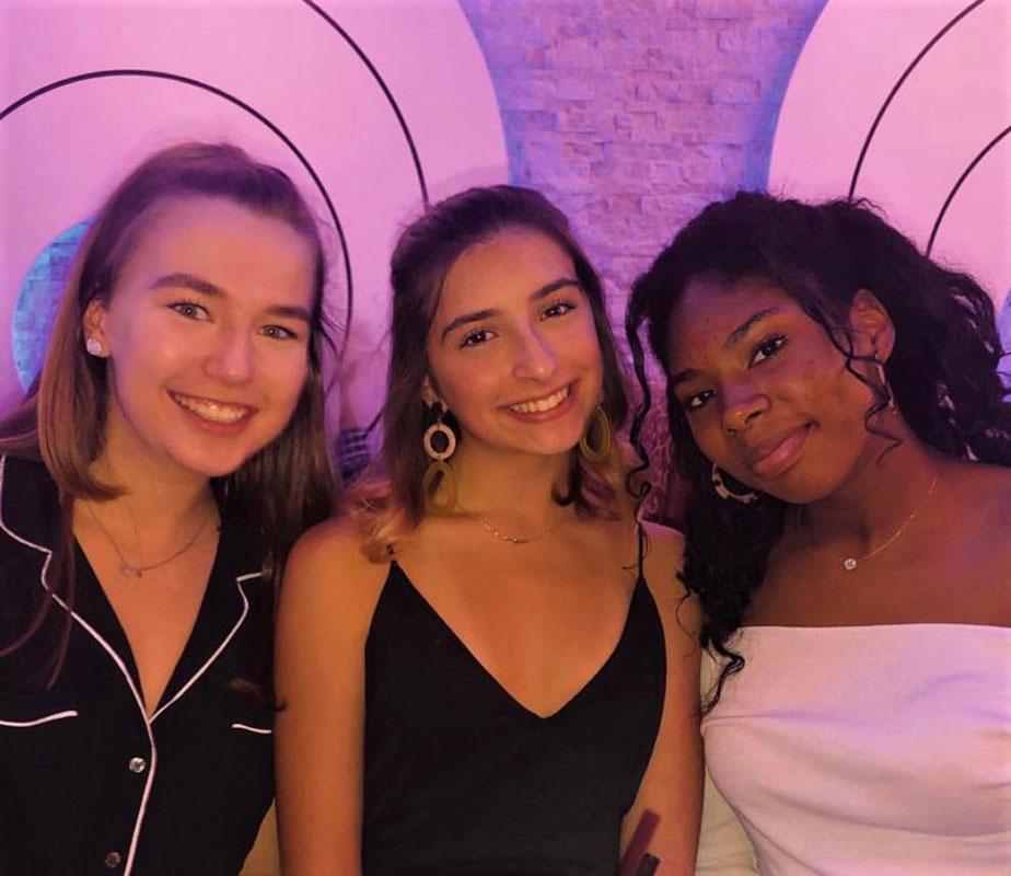 Bianca Lella (center) is flanked by Maddie Reed and Shyann Maragh.