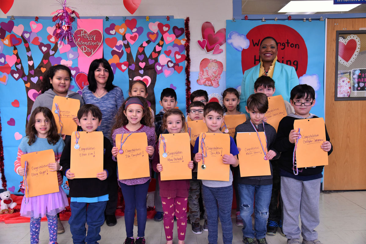 Art teacher Maria Mazzola and Principal Michelle Richards with Washington School's top artists