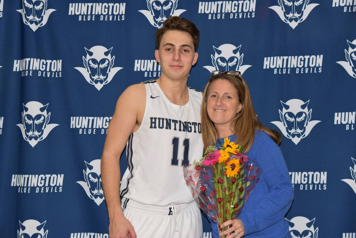 Huntington's John Paul Paci with his mom, Kelly on Senior Day 