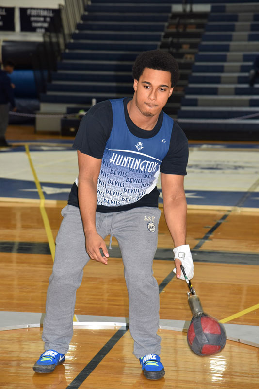 Eric Sands gets set to launch the weight throw at the state qualifier