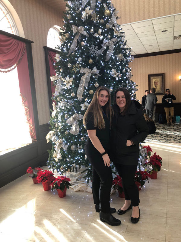 Madison Lange and Huntington business teacher Paige Tyree Furman.