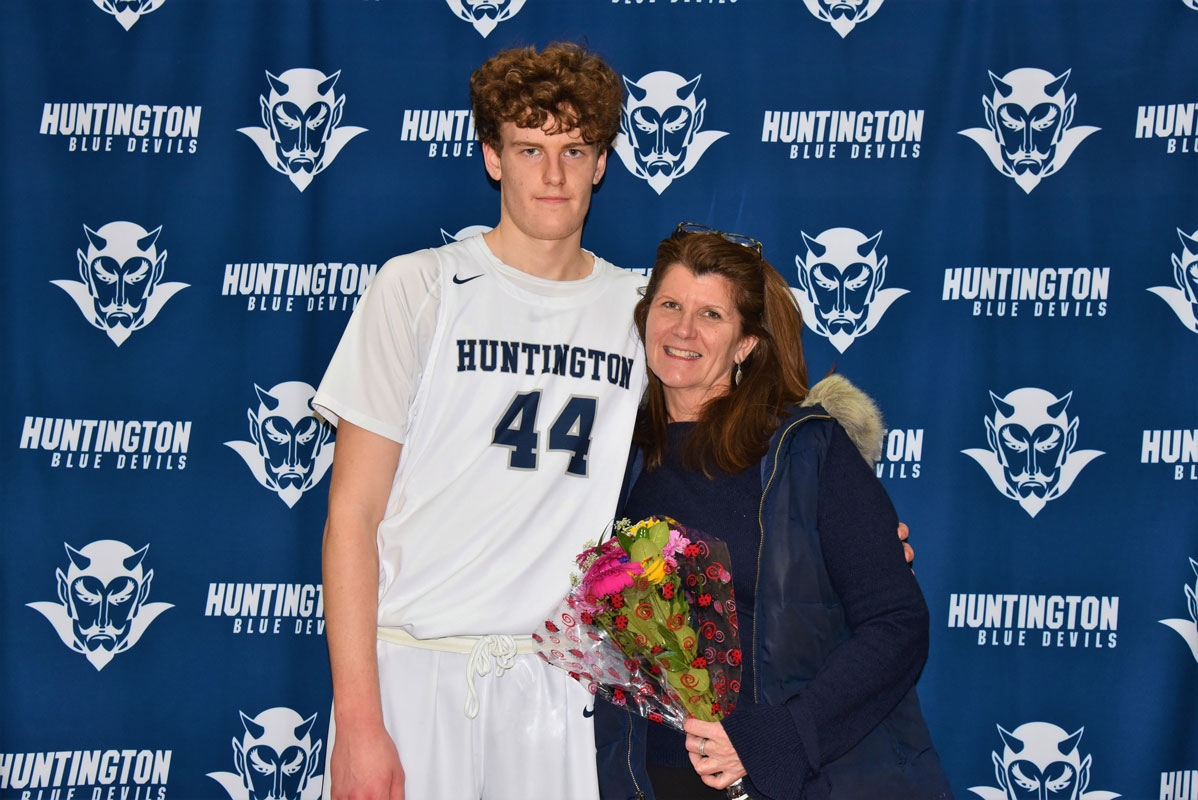 Ian Ardell and his mom, Diane on Huntington boys' basketball's Senior Day 