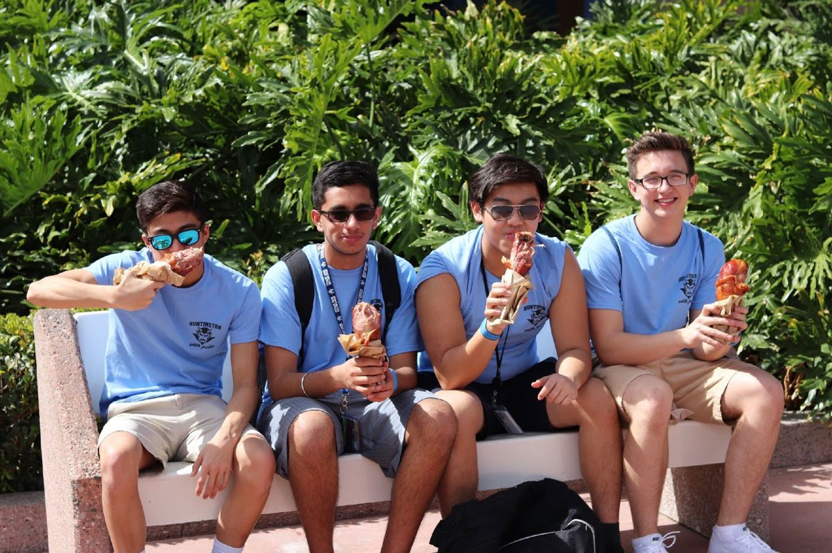 Nathan Gamboa (left) and his Blue Devil marching band friends take a break for lunch.