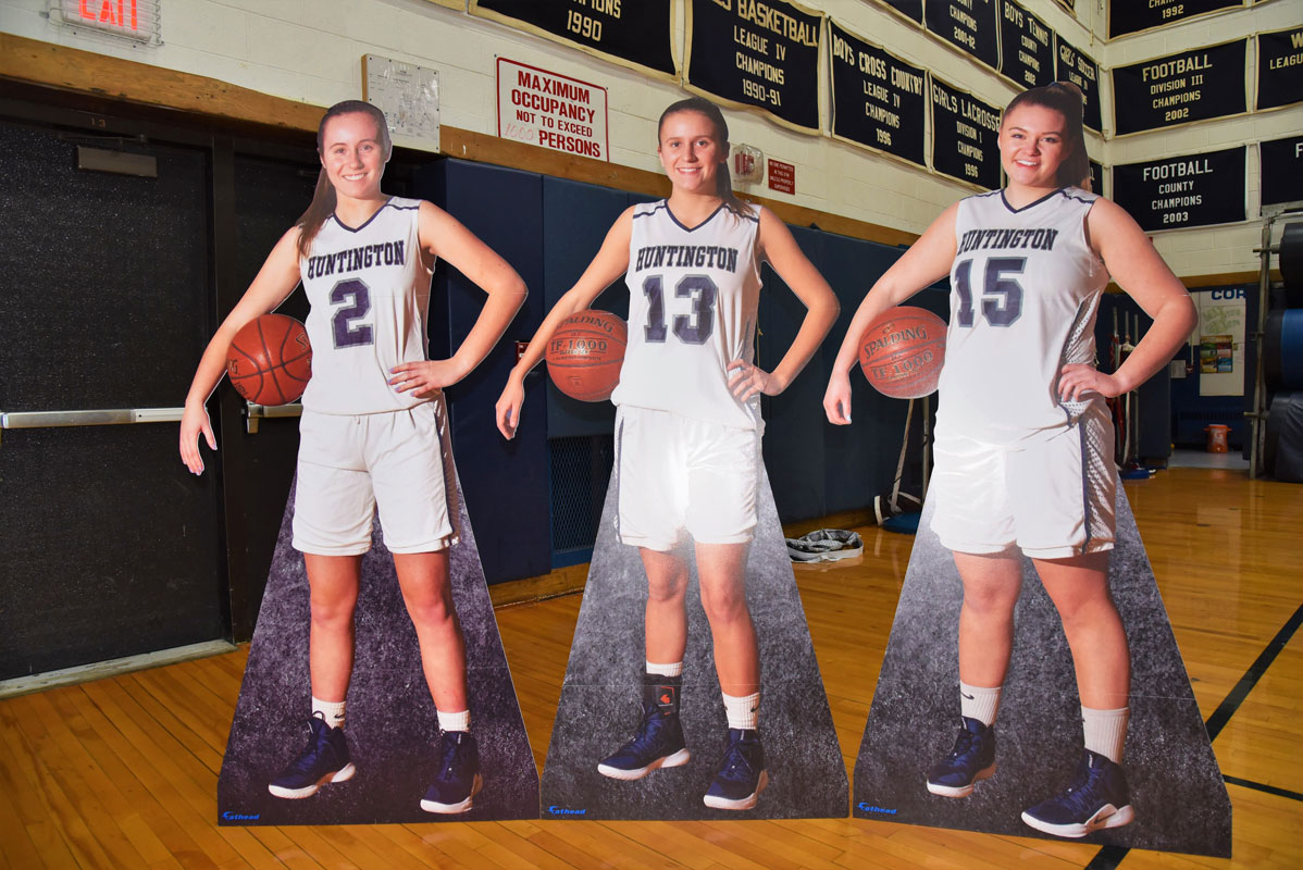 Lifesize cardboard cutouts of each senior were on display at courtside 