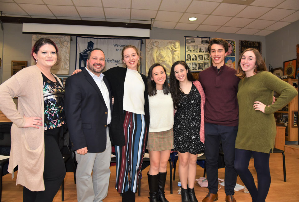Tri-M faculty advisors Victoria Garbarino and Brian Stellato with the organization's executive board 