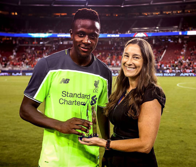 Susie Fiore presenting the ICC Man of the Match Award to Liverpool's Divock Origi.