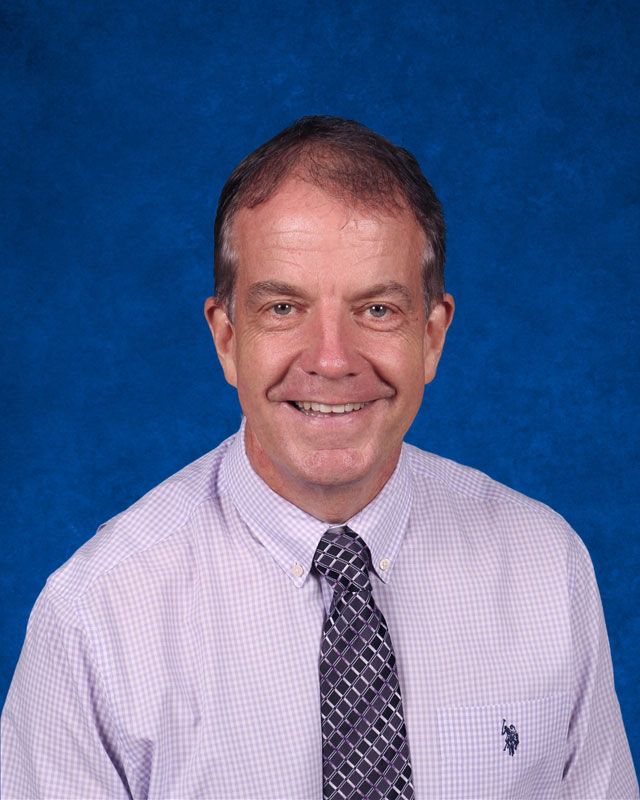 Robert Gilmor III founded Huntington's Habitat for Humanity chapter and serves as its faculty advisor.