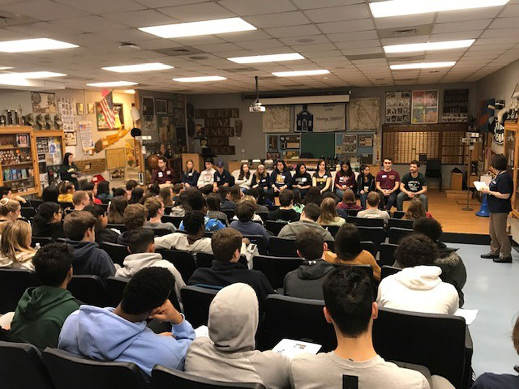 An alumni panel met with current Huntington High School students last Friday morning.