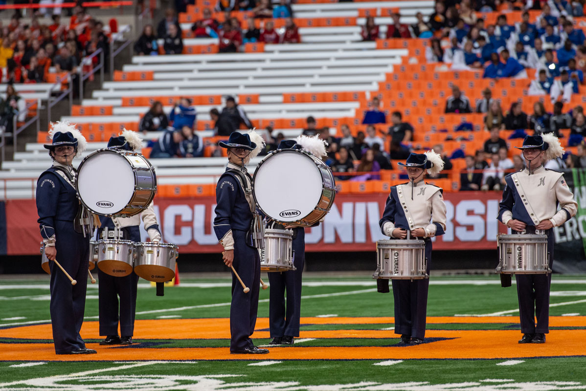 Oskar Kilgour (left) with the Blue Devil marching band drumline at the state championships.  (Darin Reed photo.)