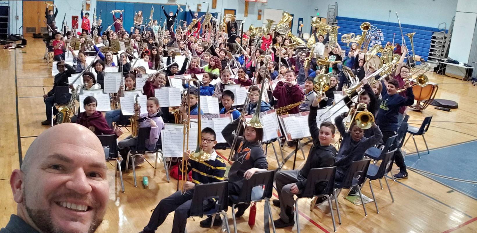  Finley music teacher Frank Battista with the Nassau’s Division 2 All-County Band 