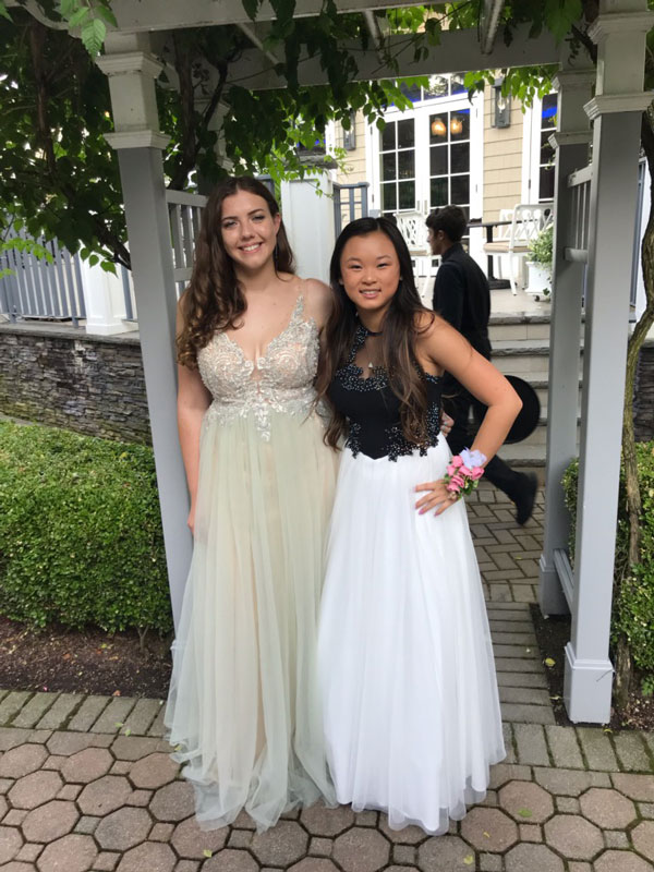 Haley Mortell (right) at last year's Huntington High School prom.
