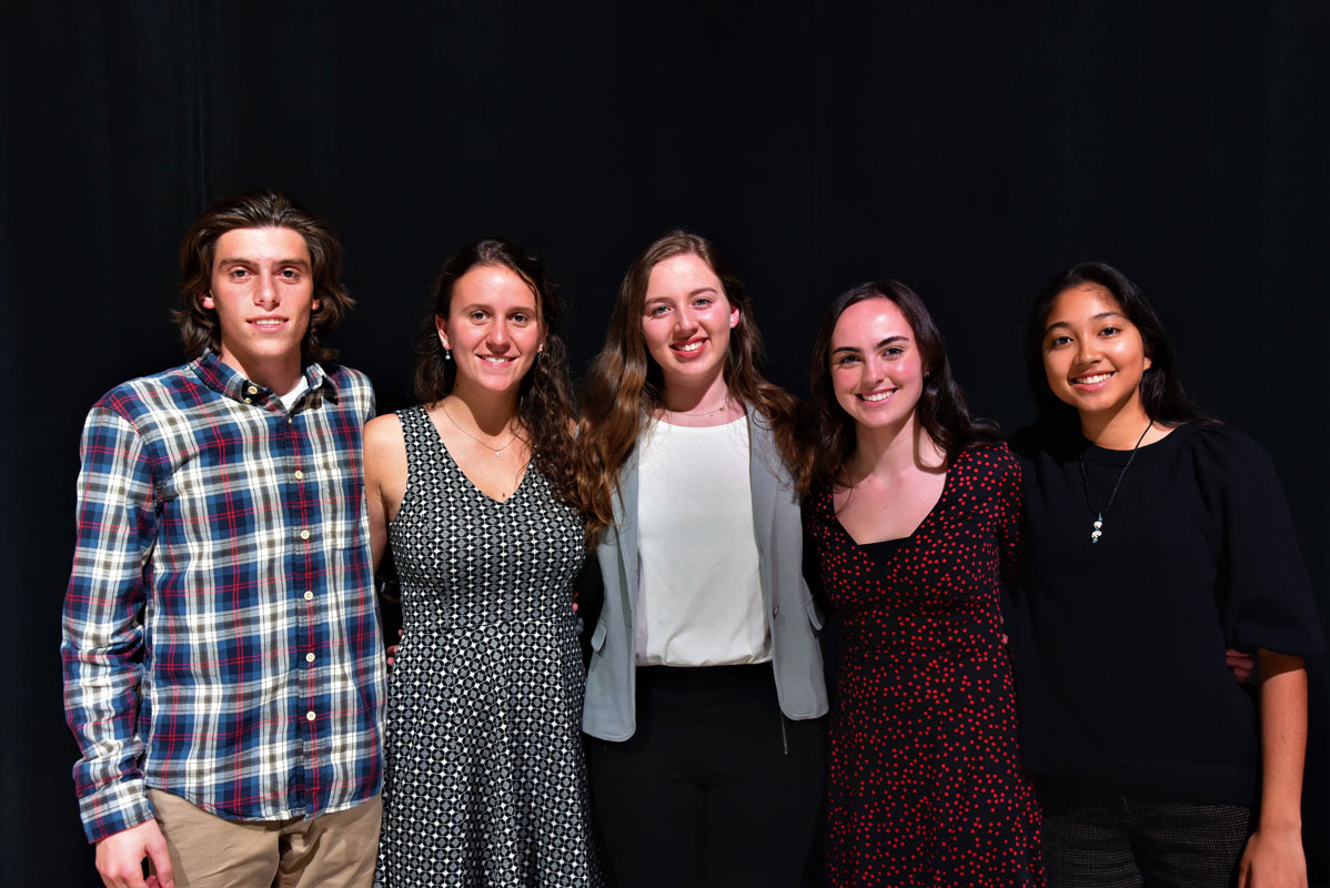 Mia Nitekman (center) is president of the Huntington National Honor Society chapter's executive board.