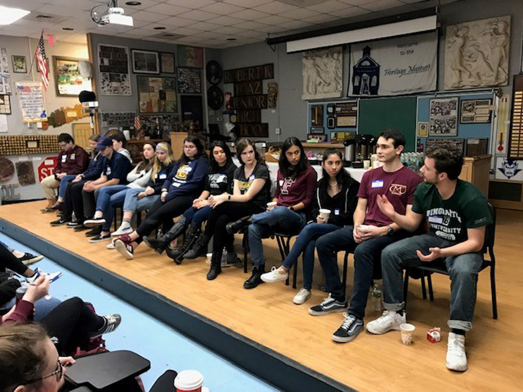 An alumni panel met with current Huntington High School students last Friday morning.