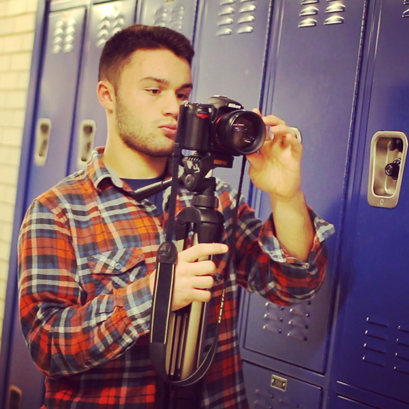 Charlie Ehrman with his camera as a Huntington High School senior.