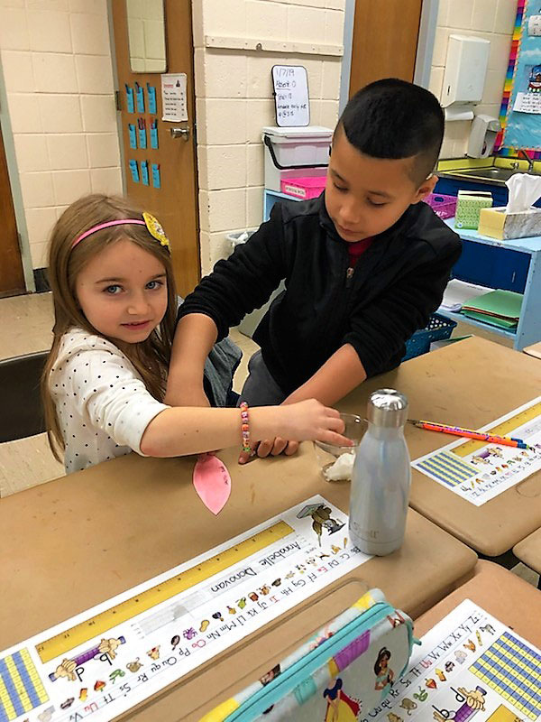 Jefferson School first graders explored how water birds use oil coated feathers to weatherproof themselves.