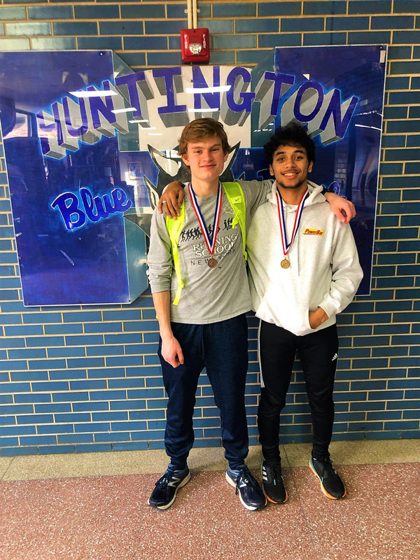 Sophomores Isaiah James (right) and Andrew McKenzie finished first and fourth in the 1000m run.
