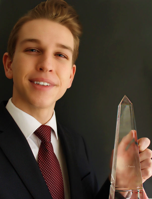 Junior John Panos can easily pass as a young business executive.