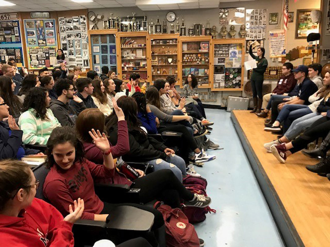 An alumni panel met with current Huntington High School students last Friday morning.