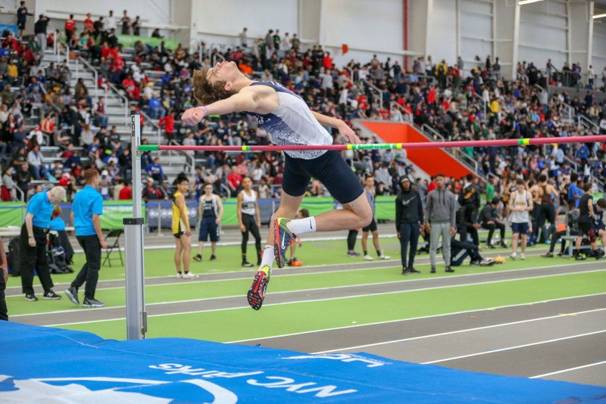 Huntington sophomore Trevan Meagher clears the high jump bat.