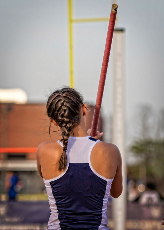 Bella Thompson readies herself for a pole vault attempt. (Mike Connell photo.)