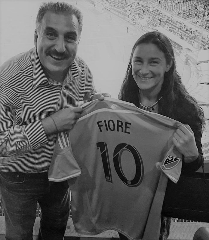 Susie Fiore with sportscaster Fernando Fiore.