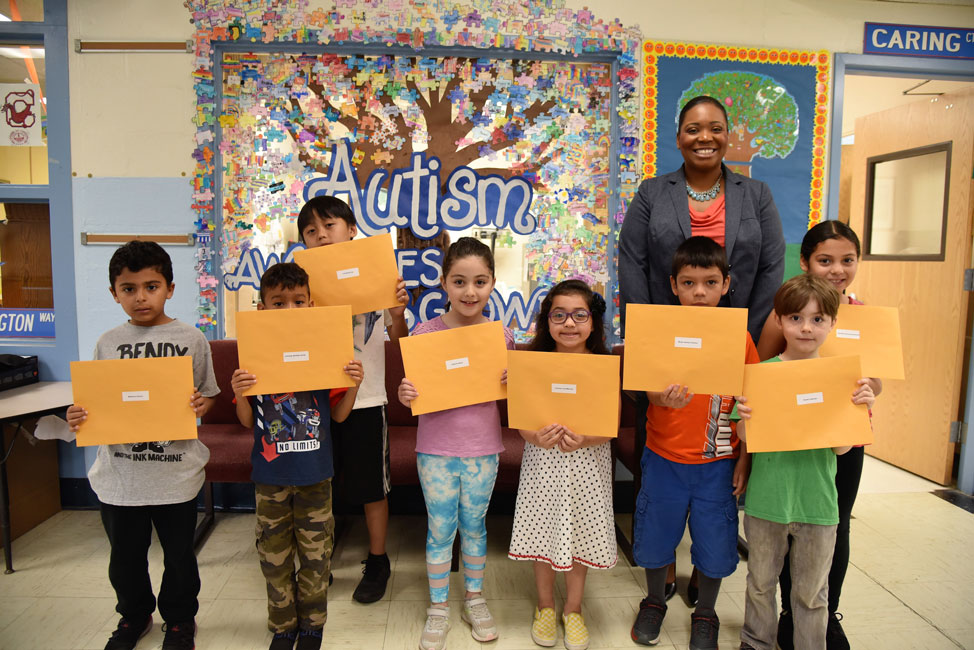 Principal Michelle Richards with Washington School's Perfect Attendance Award recipients for 2018-19 