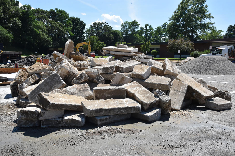 Curbs and walkways are being replaced all around Woodhull School 