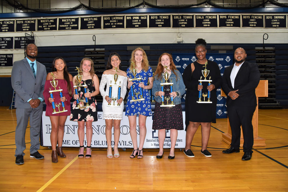 Blue Devil girls' track and field 2018-19 senior award recipients with coaches Mark Jackson and Eddie Santos 