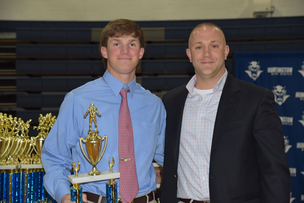 Senior Anthony Martin with Huntington head wrestling coach Louis R. Giani 