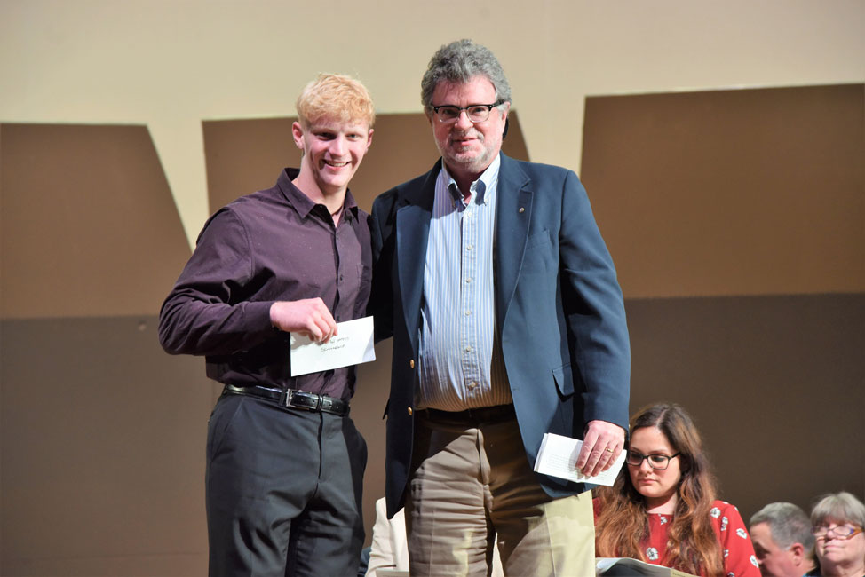 Quentin Sammis Memorial Scholarship Award recipient Nicholas Haupt with Kiwanis Club Treasurer John Reilly 