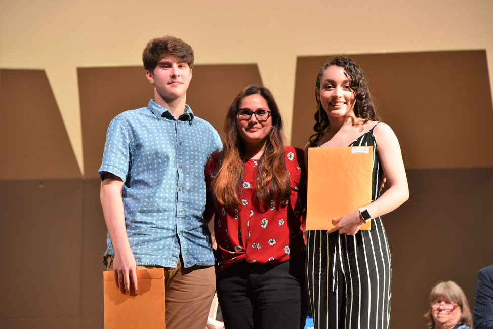 Counselor Diana Bonilla with Triple C Award recipients Sam Roberts and Ilsi Martinez Euceda.